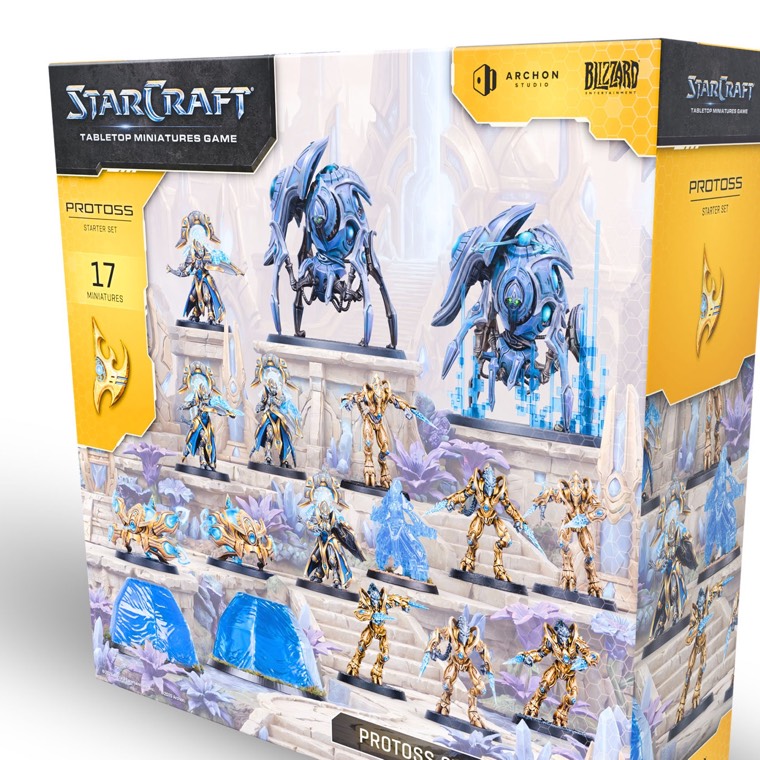 The Protoss Starter Set box, showing gold-armored zealots, robed adepts, sentries and two large blue stalkers.